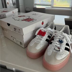 adidas White and Black Athletic Shoes with Pink Soles